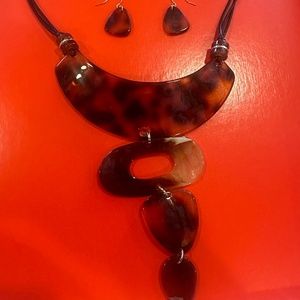 Leopard design statement necklace and earrings set.